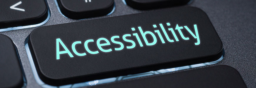 Close-up of a computer keyboard, with a button labeled 'Accessibility'.